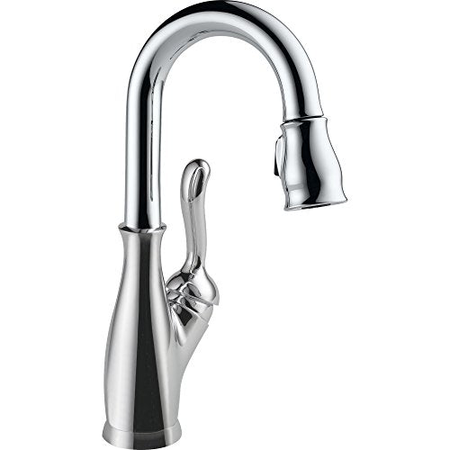Chrome single-handle pull-down kitchen faucet with curved spout and lever control.