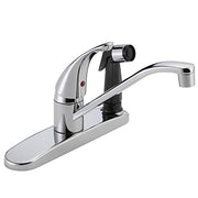 Chrome single handle kitchen faucet with curved spout and detachable spray head on wide base.