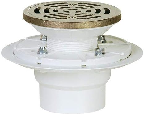 Two inch PVC shower pan drain with nickel bronze grate and white plastic base with mounting brackets.