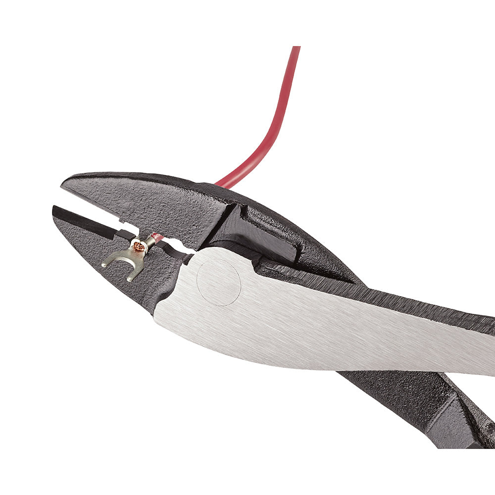 Red and black Milwaukee crimping pliers with textured grip and copper wire connector visible in jaw.