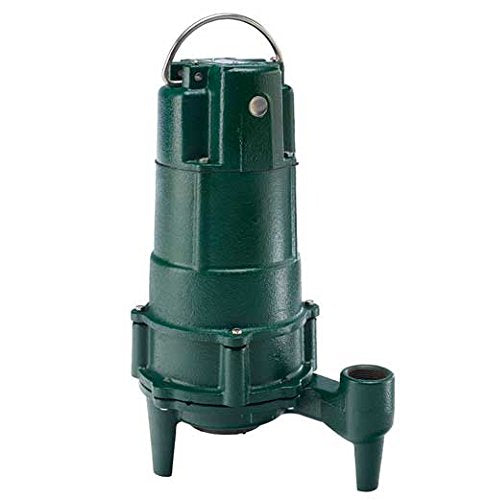 Green cast iron submersible grinder pump with handle, discharge outlet, and short legs.