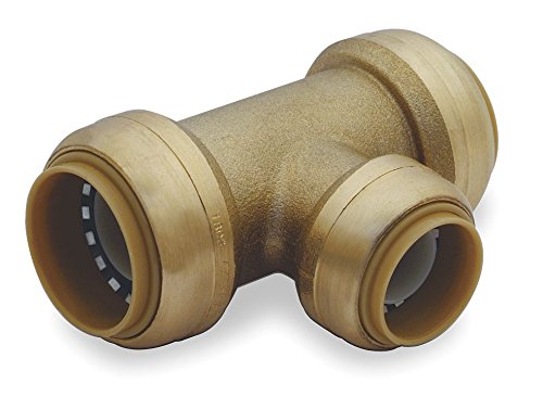 Brass Sharkbite tee fitting with three push-to-connect ports in varying sizes, featuring visible internal seals.