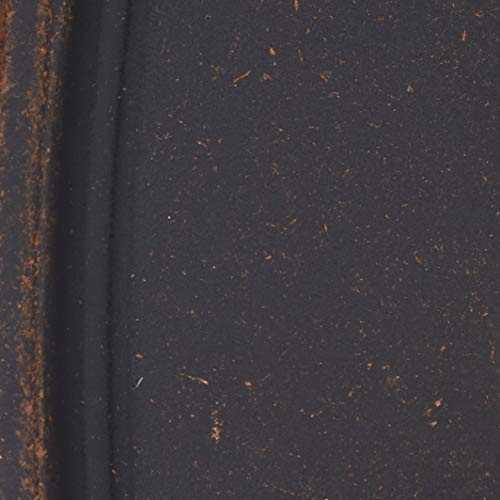 Oil rubbed bronze shower valve trim with visible wear patina and textured surface finish.