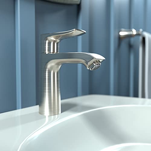 Brushed nickel single-hole bathroom faucet with curved spout and lever handle mounted on white sink.