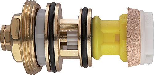 Grohe chrome inner cartridge assembly with brass, rubber, and plastic components stacked together.