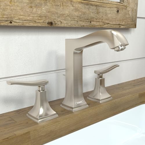 Brushed nickel three-piece widespread faucet with tall center spout, lever handles, and square base mounted on wooden counter