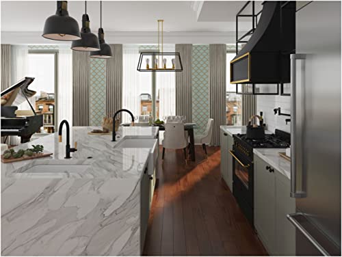 Antique gold pull-down kitchen faucet with curved C-spout mounted on white marble countertop.