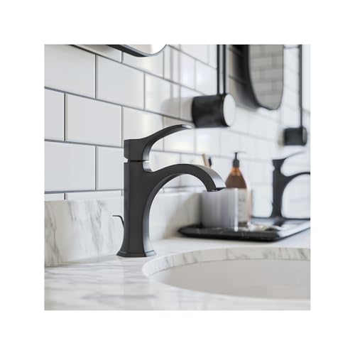 Matte black single-hole bathroom faucet with curved spout and handle installed on white marble countertop.