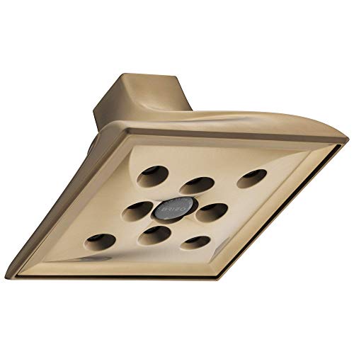 Champagne-colored square raincan shower head with multiple spray jets and angled mounting bracket.