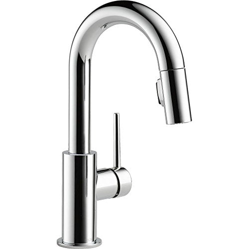 Chrome pull-down kitchen faucet with curved spout and single handle control.