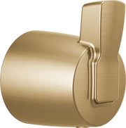 Champagne bronze cylindrical diverter lever with integrated handle and brushed metal finish.