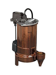 Cast iron sump pump with black motor head, copper-colored cylindrical tank, black cord, and discharge outlet.