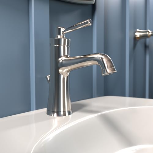 Polished nickel single-hole bathroom faucet with curved spout and lever handle mounted on white sink.