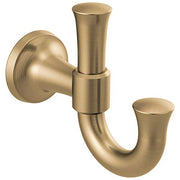 Two champagne bronze robe hooks with curved arms and round mounting plates.