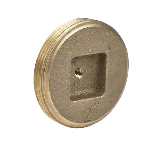 Brass cleanout plug with recessed square head and threaded center hole, viewed at angle.