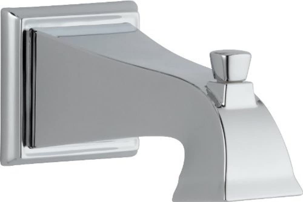 Chrome tub spout with pull-up diverter and wall-mounted square escutcheon plate.