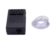 Black rectangular air switch box with two outlet ports and clear plastic tubing coiled beside it.