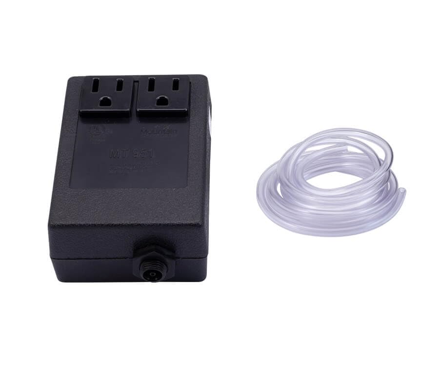 Black rectangular air switch box with two outlet ports and clear plastic tubing coiled beside it.
