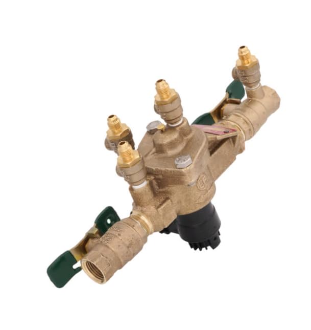 Brass backflow preventer with four brass outlet ports, green shut-off valves, and black flood sensor attached below.