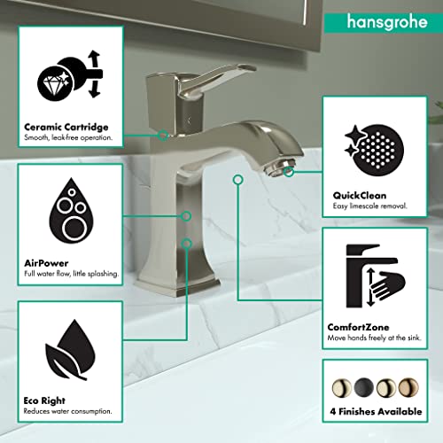 Polished nickel single-hole bathroom faucet with curved spout and pop-up drain on marble countertop.
