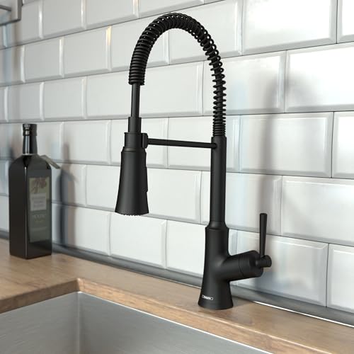 Matte black semi-pro kitchen faucet with coiled pull-down spray head and single lever handle mounted on countertop.