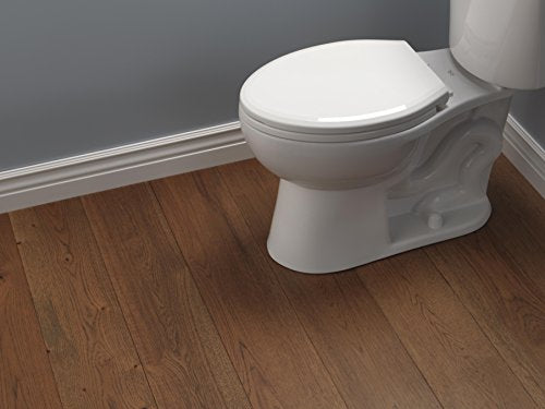 White elongated toilet seat with slow-close lid on white porcelain bowl against wood flooring.