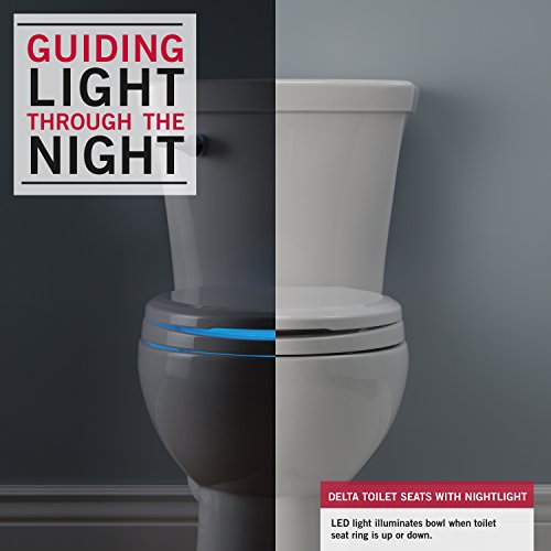 White elongated toilet seat with nightlight feature and slow-close mechanism shown in dark and light settings.