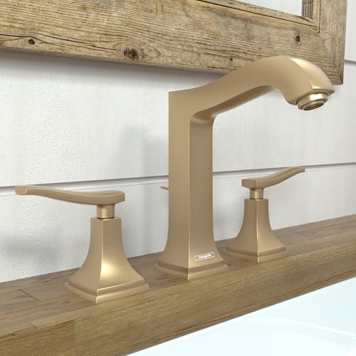 Brushed bronze widespread bathroom faucet with tall center spout, lever handles, and square bases on wooden counter.