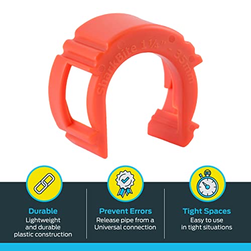 Red plastic push-to-connect disconnect tool with handle and grip features for 1-1/4 inch plumbing connections.