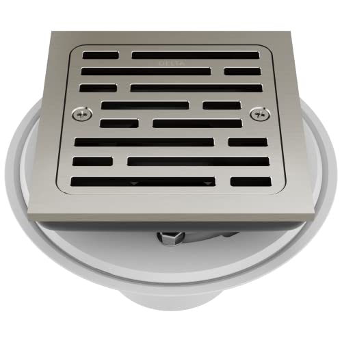 Square stainless steel shower drain with horizontal slot grating and mounting flange.