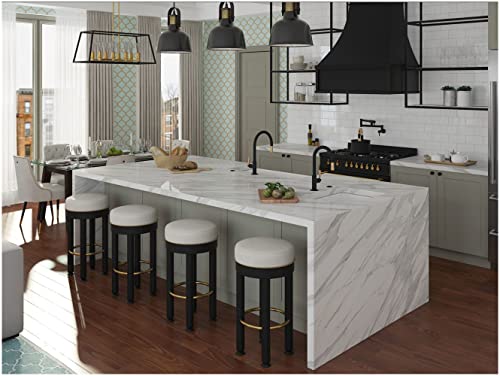 Antique gold pull-down kitchen faucet with curved C-spout installed on marble countertop island in modern kitchen.