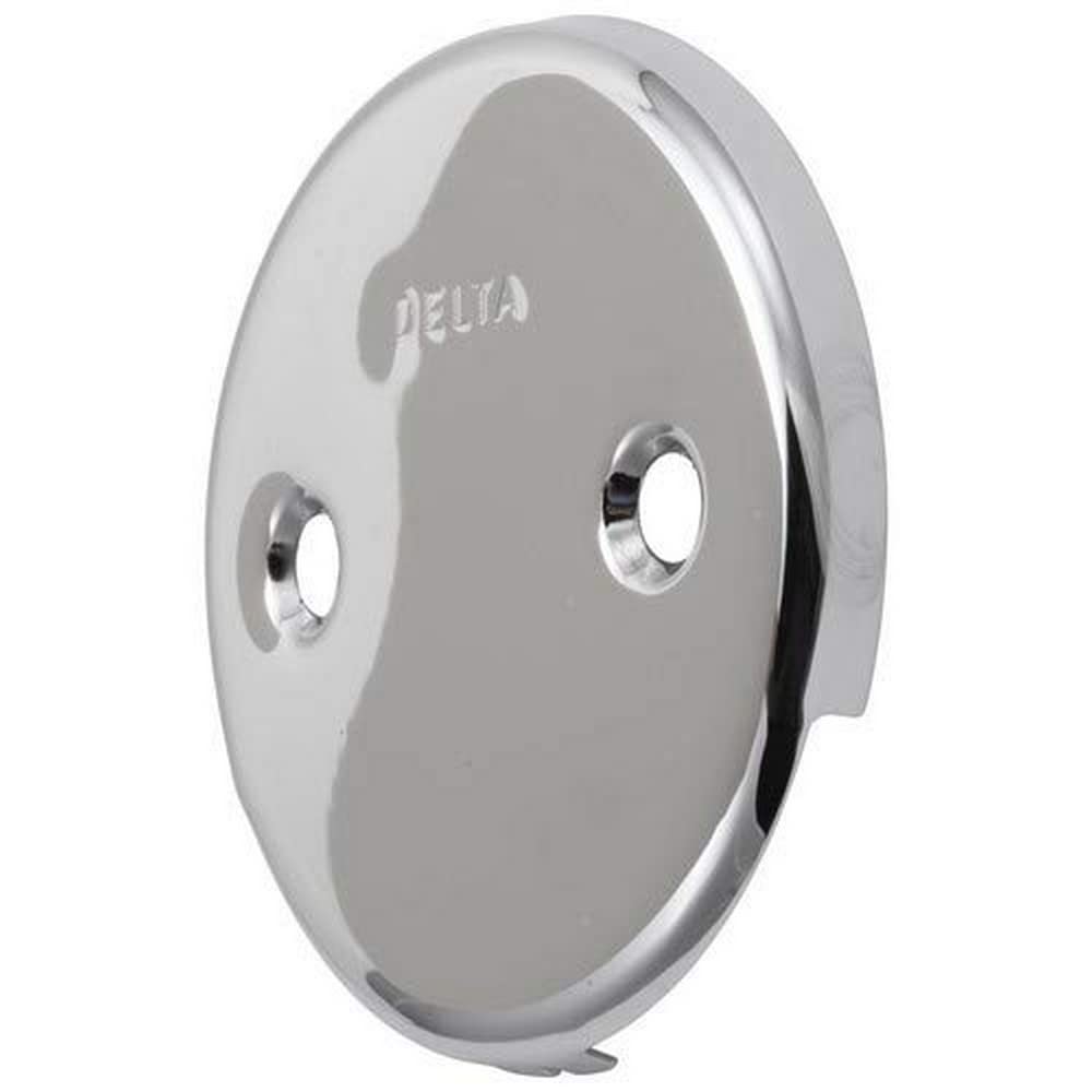 Chrome overflow plate with Delta logo and two mounting holes on circular escutcheon.