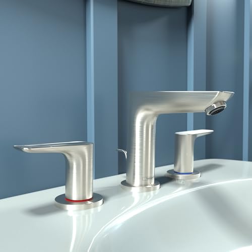 Brushed nickel three-piece widespread bathroom faucet with curved spout and lever handles on white sink.