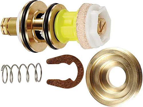 Grohe 43812000 repair kit containing brass discs, neon yellow cartridge, white ceramic seat, metal spring, and bronze clip.