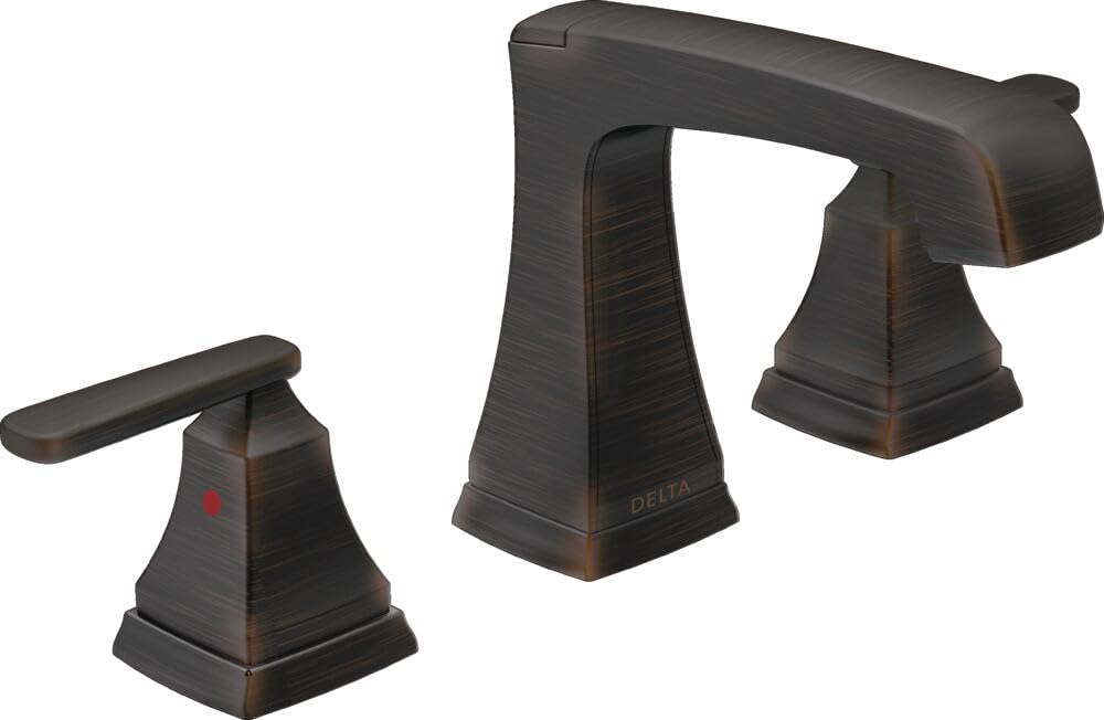Bronze two-handle widespread bathroom faucet with tapered square bases and curved spout.