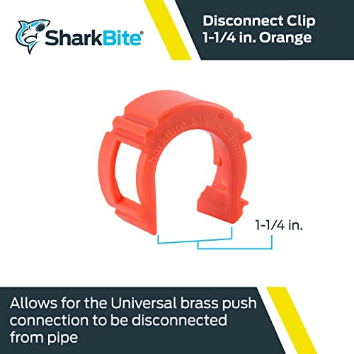 Red plastic 1-1/4 inch disconnect tool with curved handle and rectangular grip sections.