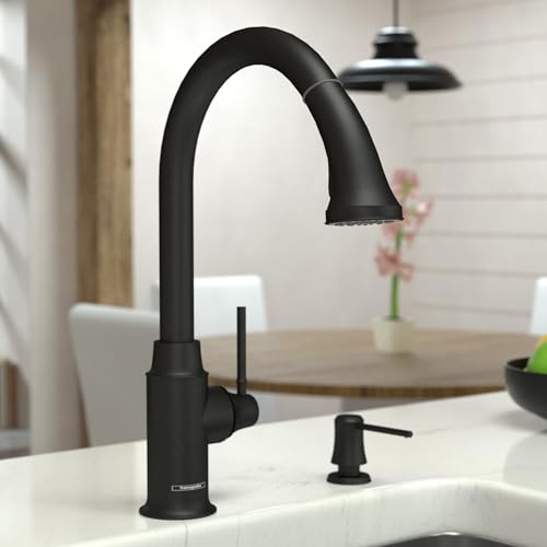 Matte black high-arc kitchen faucet with pull-down spray head and single lever handle on white sink.