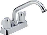 Chrome two-handle laundry faucet with high-arc spout and wide deck base.