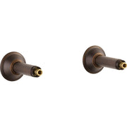 Pair of Venetian bronze wall-mount tub filler unions with brass connectors and circular flanges.