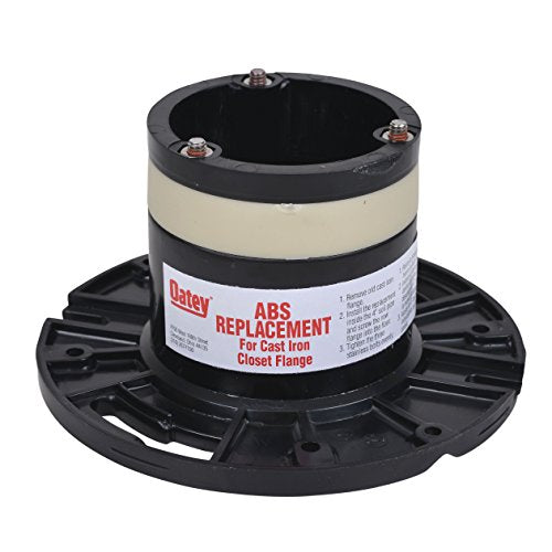 Black ABS closet flange with cream-colored band and mounting bolts on wide base plate.
