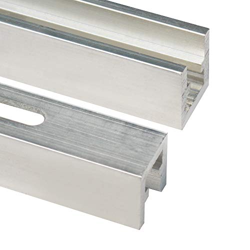 Stainless steel undermount sink trim rails with white and gray textured finishes.