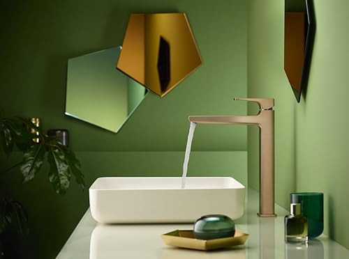 Brushed bronze single-hole bathroom faucet with tall spout and lever handle above white rectangular sink.
