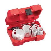 Red plastic case containing nine white hole saws of varying sizes and one black arbor tool.