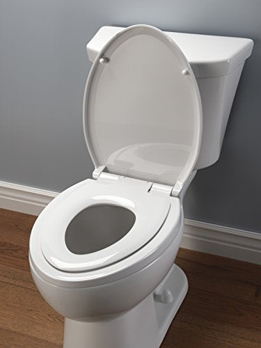White elongated toilet seat with slow-close lid and nightlight feature mounted on white porcelain bowl.