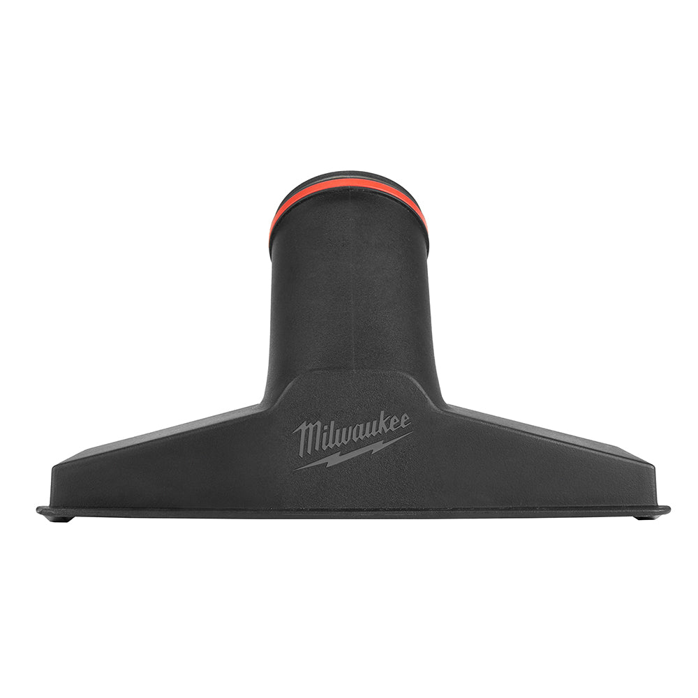 Black floor utility nozzle with red band and Milwaukee branding, wide flat base for carpet and hard surfaces.