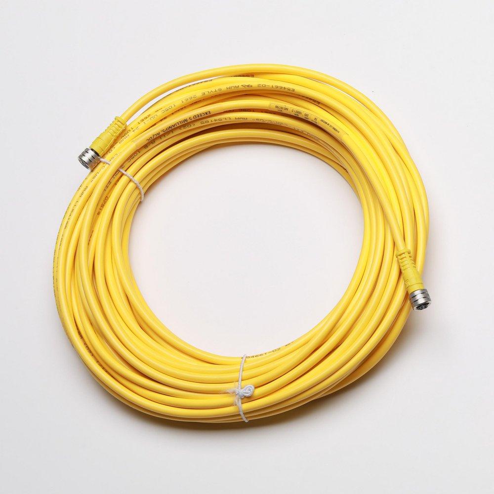 Yellow data link control cable coiled with metal connectors at both ends.