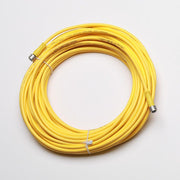 Yellow data link control cable coiled with metal connectors at both ends.