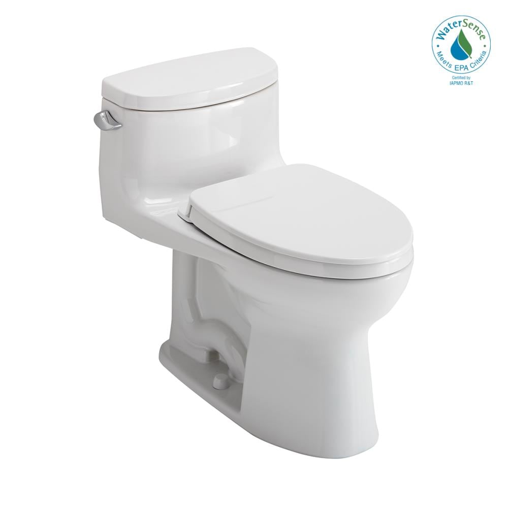 White one-piece elongated toilet with closed lid and integrated tank, featuring rounded bowl design and water supply valve.