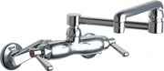 Chrome wall-mounted faucet with double-jointed swing spout and dual lever handles.