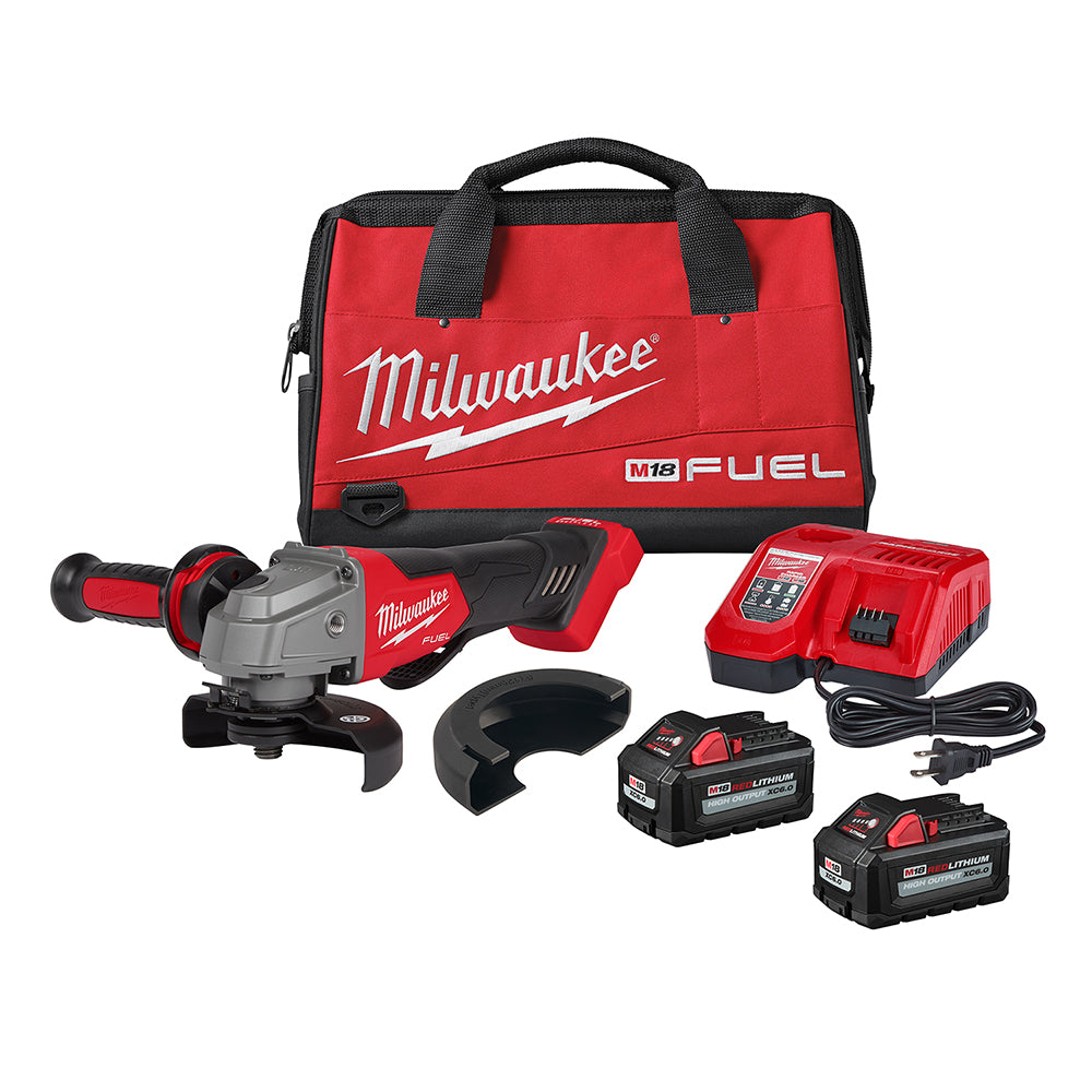 Milwaukee M18 FUEL angle grinder kit with red and black carrying bag, grinder, guard, two batteries, charger, and power cord.